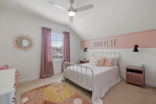 bedroom featuring carpet flooring, ceiling fan, baseboards, and lofted ceiling