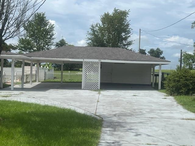 garage with a carport