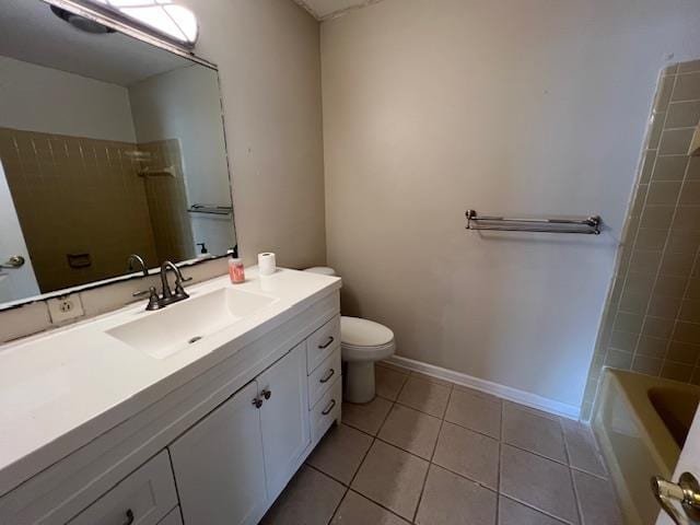 full bathroom featuring vanity, tile patterned floors, toilet, and tiled shower / bath