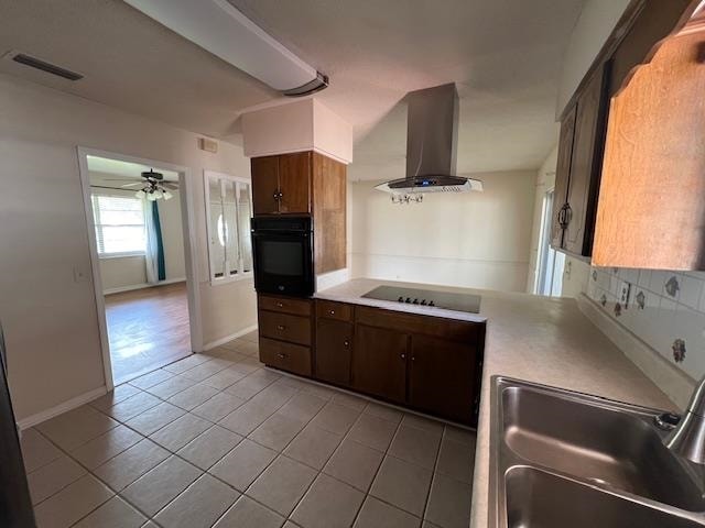 kitchen with black appliances, extractor fan, light tile patterned floors, sink, and ceiling fan