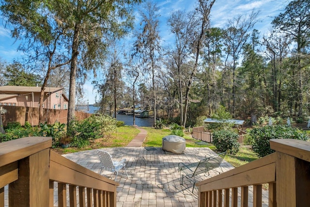 view of patio / terrace featuring a water view