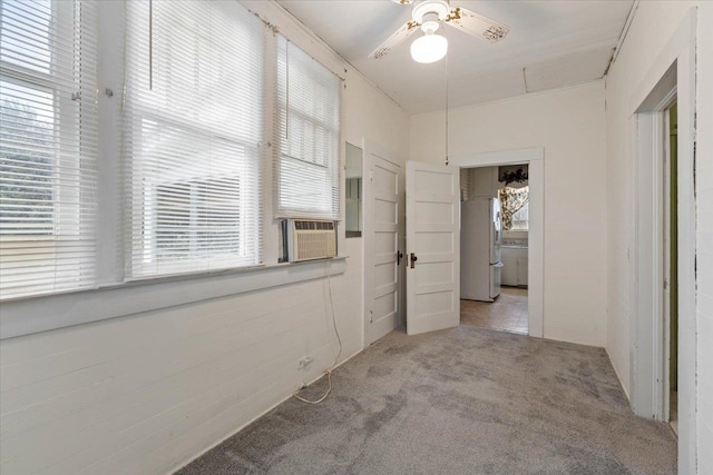 corridor featuring cooling unit and light colored carpet