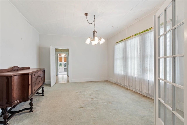 interior space featuring a notable chandelier