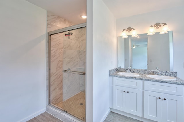 2017 Pemberton Ct, Tallahassee, FL 32309 - bathroom with vanity, hardwood / wood-style flooring, and a shower with shower door