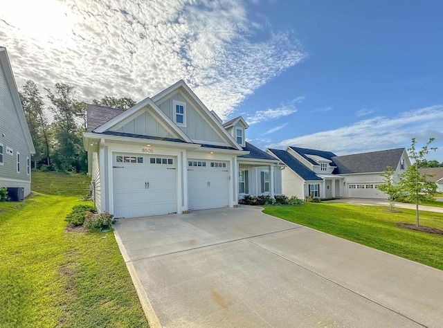 craftsman-style house featuring central AC, a garage, and a front lawn