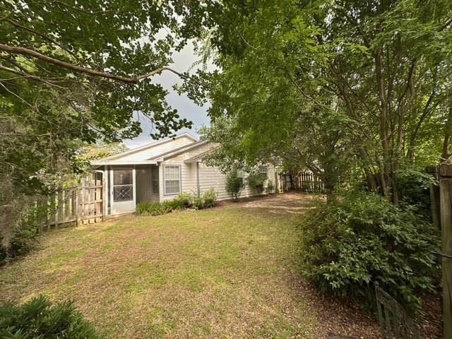 5356 Tewkesbury Trce, Tallahassee, FL 32309 - view of yard featuring a sunroom