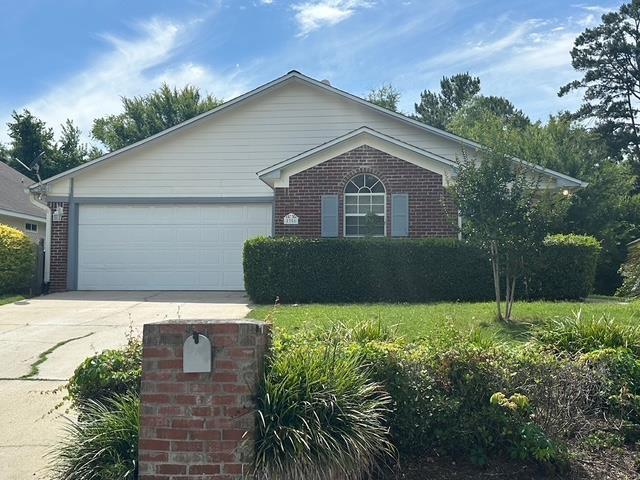 5356 Tewkesbury Trce, Tallahassee, FL 32309 - single story home featuring driveway, brick siding, and a garage