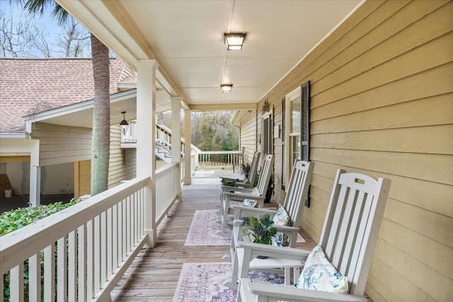 wooden deck featuring a porch