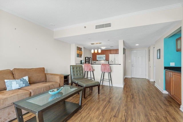 300 S Duval St Unit 503, Tallahassee, FL 32301 - living area with dark wood finished floors, ornamental molding, and baseboards
