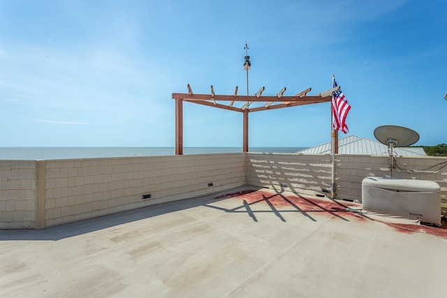 view of patio / terrace with a water view