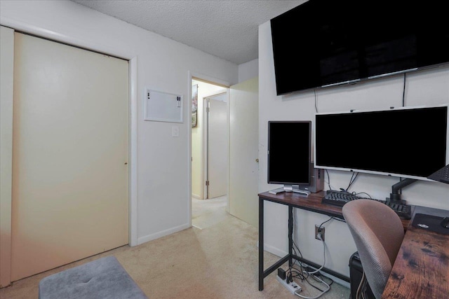 1520 Pullen Rd Unit 6, Tallahassee, FL 32303 - office area with light colored carpet, a textured ceiling, and baseboards