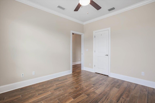 empty room with ceiling fan and ornamental molding