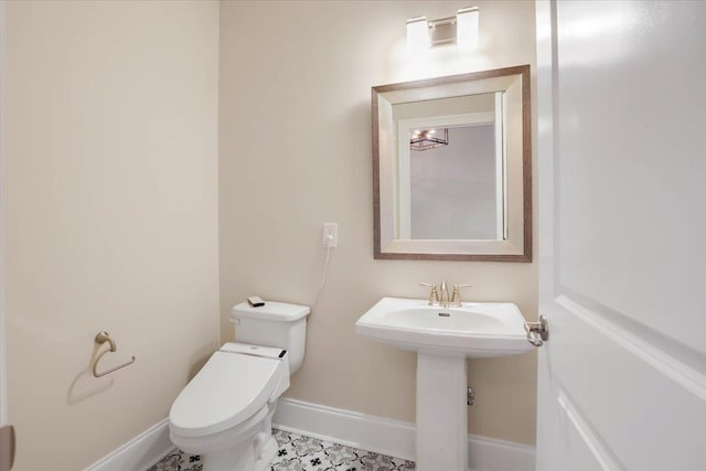 bathroom featuring toilet