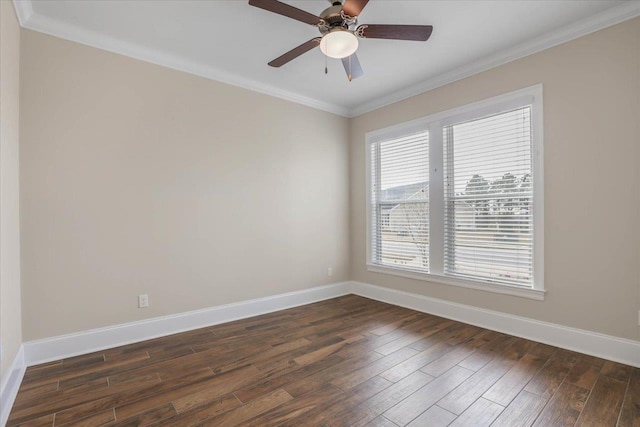 spare room with ceiling fan, dark hardwood / wood-style flooring, and crown molding