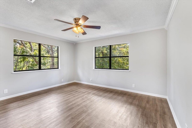 16552 198th Trace, Trace, FL 32071 - unfurnished room featuring plenty of natural light, wood finished floors, a textured ceiling, ornamental molding, and a ceiling fan