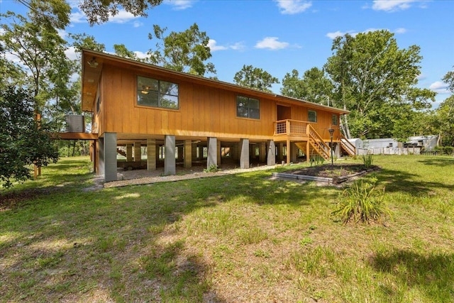 16552 198th Trace, Trace, FL 32071 - rear view of property featuring stairway and a yard