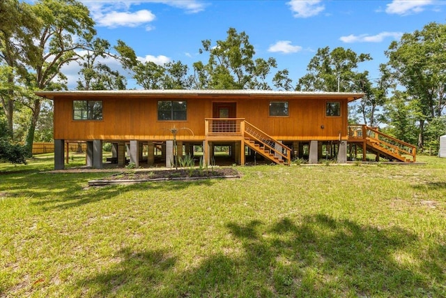 16552 198th Trace, Trace, FL 32071 - rear view of house with stairs and a yard