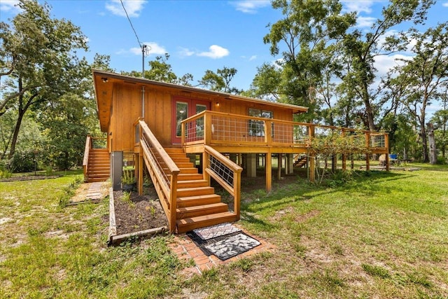 16552 198th Trace, Trace, FL 32071 - rear view of property with stairway, a yard, a wooden deck, and french doors