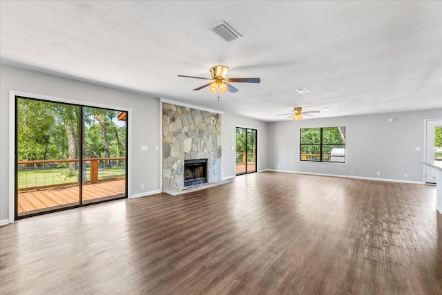 16552 198th Trace, Trace, FL 32071 - unfurnished living room with ceiling fan, wood finished floors, and a fireplace