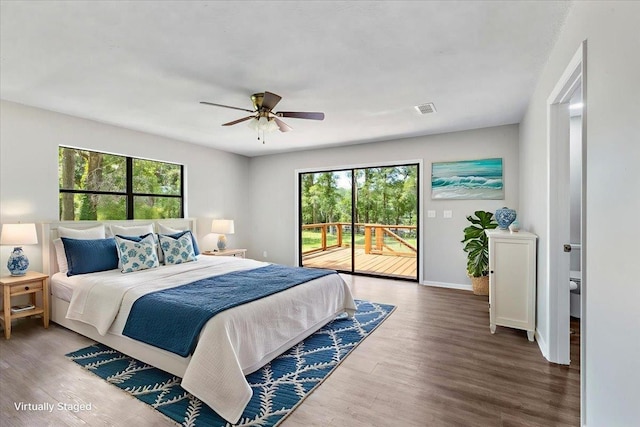 16552 198th Trace, Trace, FL 32071 - bedroom featuring access to outside, multiple windows, and wood finished floors