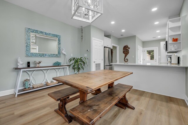 131 Delaware St, Carrabelle, FL 32323 - dining room with light wood-style flooring and recessed lighting