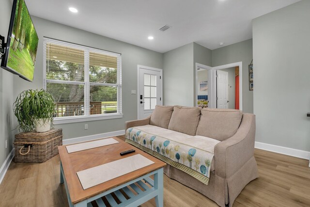 131 Delaware St, Carrabelle, FL 32323 - living area featuring light wood-style flooring and recessed lighting
