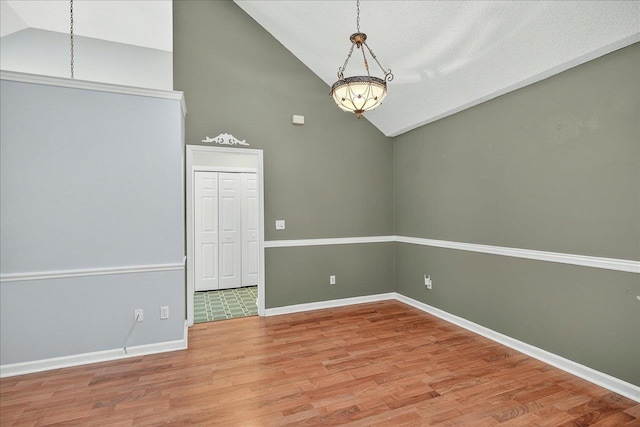 2032 Ascot Way, Tallahassee, FL 32312 - unfurnished room featuring wood finished floors and high vaulted ceiling