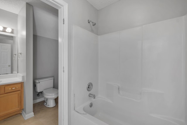 1997 Maymeadow Ln, Tallahassee, FL 32303 - bathroom with toilet, washtub / shower combination, vanity, a textured ceiling, and tile patterned floors