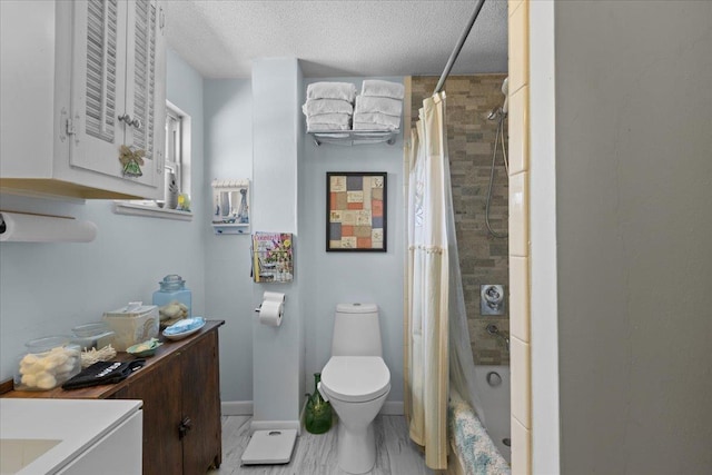 full bathroom with toilet, vanity, shower / bathtub combination with curtain, and a textured ceiling