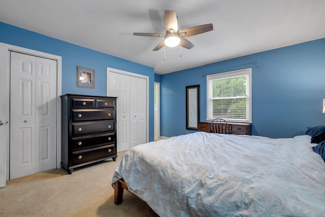 3514 Tullamore Ln, Tallahassee, FL 32309 - bedroom featuring multiple closets, light colored carpet, and ceiling fan