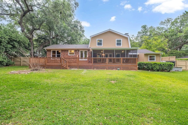 3514 Tullamore Ln, Tallahassee, FL 32309 - rear view of property featuring a sunroom, a deck, and brick siding