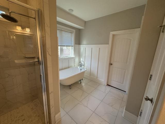 bathroom with shower with separate bathtub