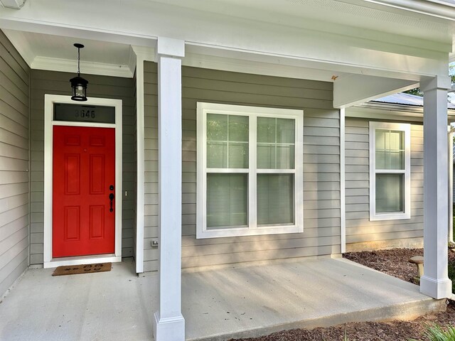 3646 Homestead Rd, Tallahassee, FL 32309 - view of exterior entry featuring a porch