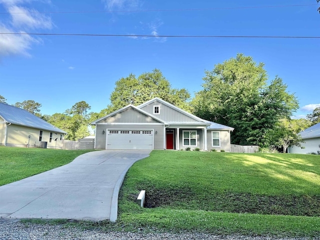 3646 Homestead Rd, Tallahassee, FL 32309 - view of front of property featuring concrete driveway, an attached garage, and board and batten siding