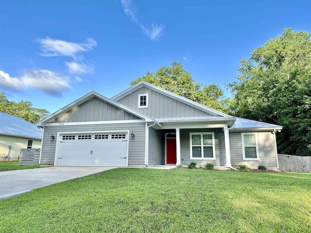 3646 Homestead Rd, Tallahassee, FL 32309 - view of front of property featuring a garage, driveway, board and batten siding, and covered porch