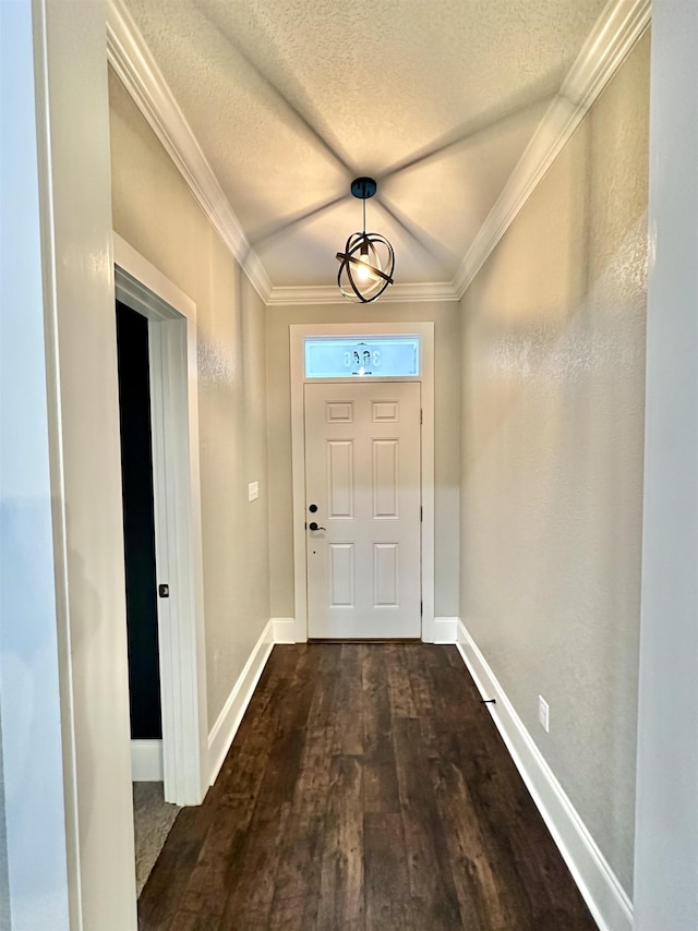 3646 Homestead Rd, Tallahassee, FL 32309 - entryway with dark wood finished floors, baseboards, a textured ceiling, and crown molding