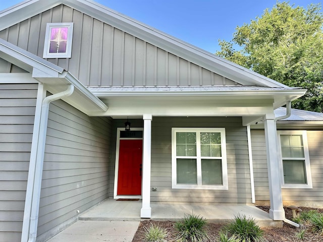 3646 Homestead Rd, Tallahassee, FL 32309 - view of exterior entry featuring board and batten siding and a porch