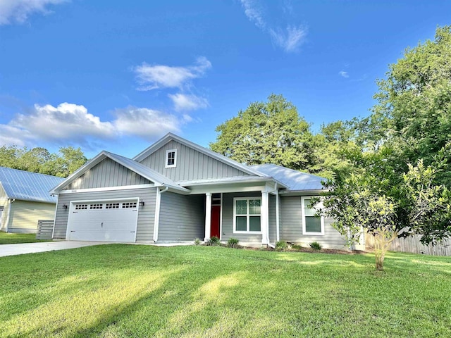 3646 Homestead Rd, Tallahassee, FL 32309 - ranch-style home featuring board and batten siding, an attached garage, and driveway