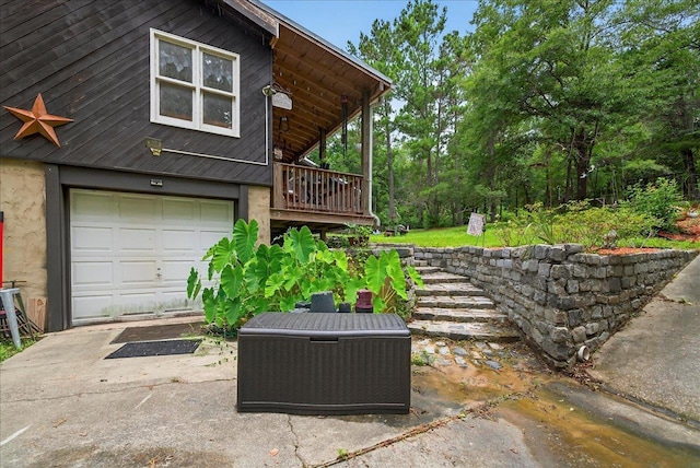 39 Wiregrass Ln, Quincy, FL 32351 - view of side of home with an attached garage and concrete driveway