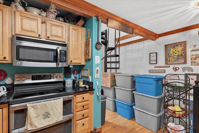 39 Wiregrass Ln, Quincy, FL 32351 - kitchen with appliances with stainless steel finishes, light wood-style flooring, dark countertops, and light brown cabinetry