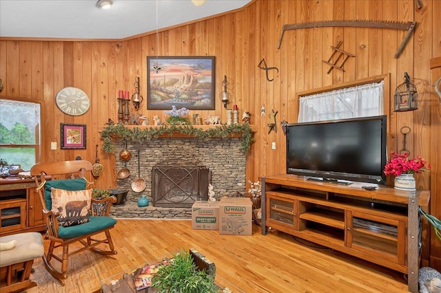 39 Wiregrass Ln, Quincy, FL 32351 - living area featuring a fireplace, wood walls, and wood finished floors