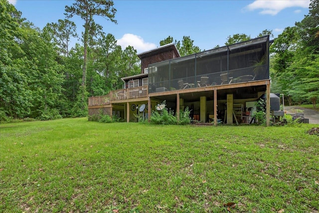 39 Wiregrass Ln, Quincy, FL 32351 - rear view of house with a sunroom, a yard, and a wooden deck