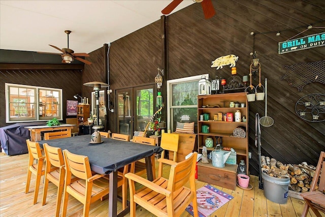 39 Wiregrass Ln, Quincy, FL 32351 - dining area featuring ceiling fan, wooden walls, and hardwood / wood-style flooring