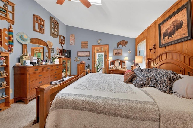 39 Wiregrass Ln, Quincy, FL 32351 - bedroom featuring carpet floors, lofted ceiling, wooden walls, and a ceiling fan