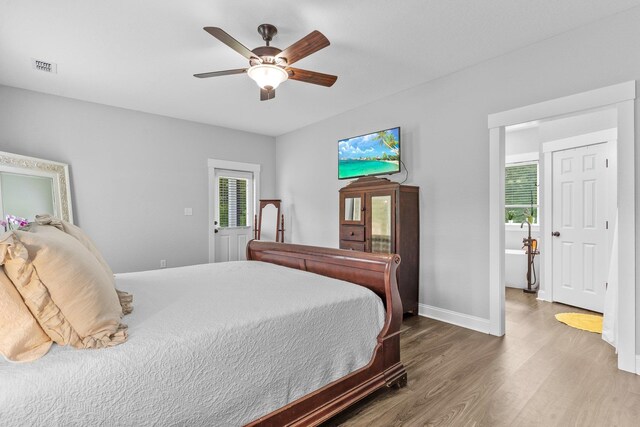 bedroom featuring hardwood / wood-style floors and ceiling fan