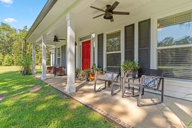 view of patio / terrace featuring ceiling fan