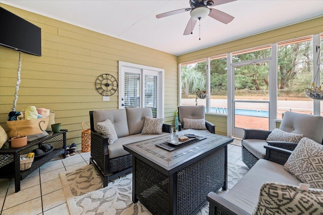 sunroom / solarium with ceiling fan