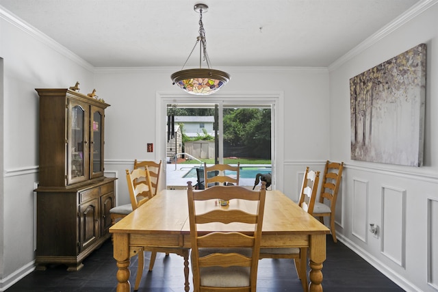 2025 Shadey Oaks Dr, Tallahassee, FL 32303 - dining space with crown molding, dark wood-type flooring, and a wainscoted wall