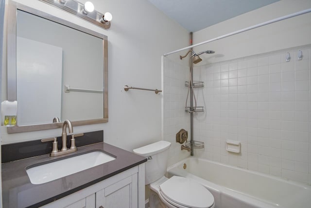 bathroom featuring shower / bathing tub combination, vanity, and toilet