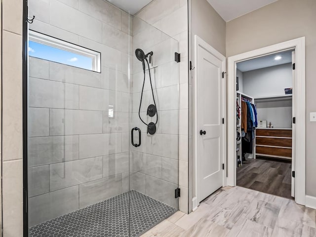 bathroom with an enclosed shower